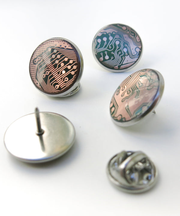 Circuit dot pins, stainless steel coverage.